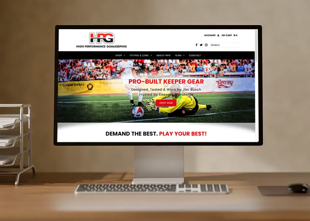 Computer monitor on desk displaying website page