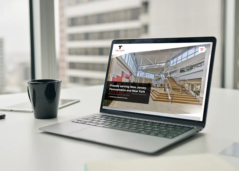 Torcon website displayed on laptop computer screen